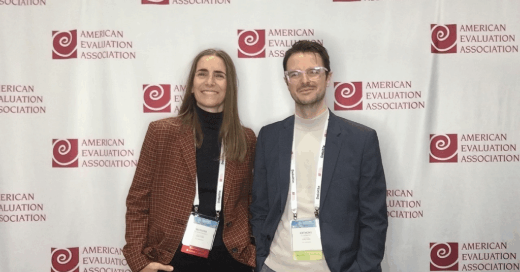 Picture of team members Dr. Mariana de Santibañes and Dr. Anthony Clairmont at the American Evaluation Association Conference